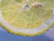 yellow lemon with water droplets