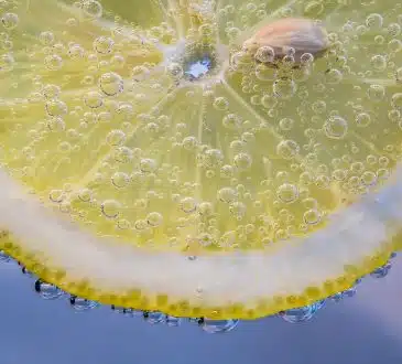 yellow lemon with water droplets