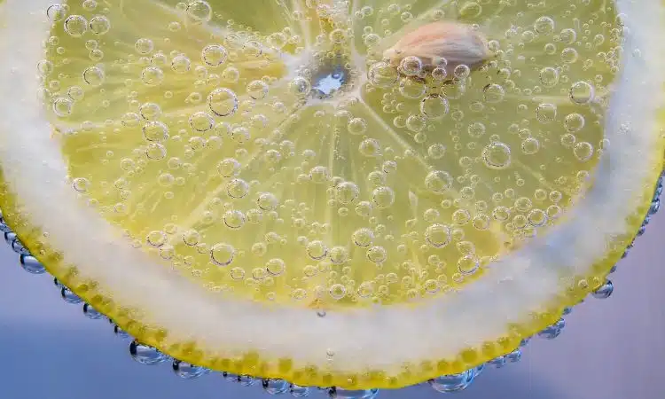 yellow lemon with water droplets